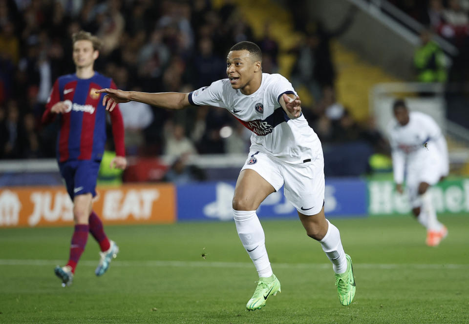 Kylian Mbappe's second-half penalty kick secured Paris Saint-Germain's place in the Champions League semifinals. (Reuters/Juan Medina)