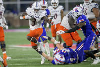 UTSA running back Sincere McCormick (3) runs with the ball in the first half of an NCAA college football game against Louisiana Tech linebacker Maki Carabin (44) in Ruston, La., Saturday, Oct. 23, 2021. (AP Photo/Matthew Hinton)