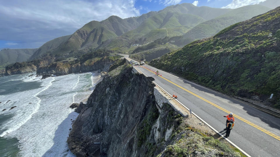 This photo provided by Caltrans shows a damaged section of Highway 1, Sunday, March 31, 2024, south of Rocky Creek Bridge in Big Sur, Calif. Authorities urged motorists to avoid the scenic highway after a section of the coastal route collapsed during an Easter weekend storm, forcing closures and stranding motorists near Big Sur, authorities said. (Caltrans District 5 via AP)