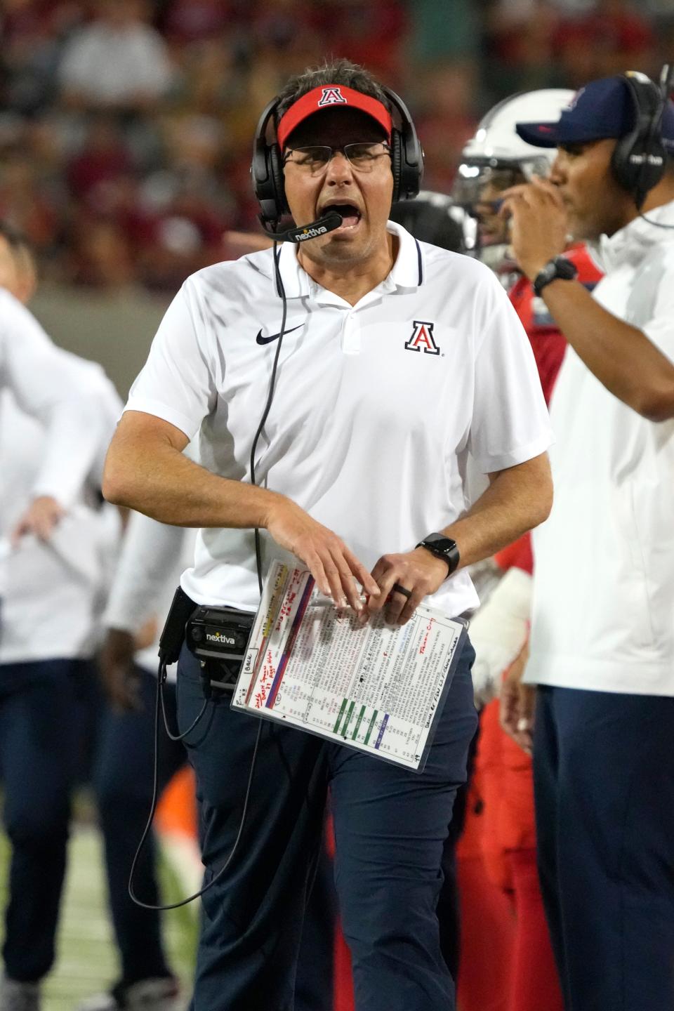 Arizona head coach Jedd Fisch reacts after a replay review during the first half of an NCAA college football game against Washington, Saturday, Sept. 30, 2023, in Tucson, Ariz. (AP Photo/Rick Scuteri)