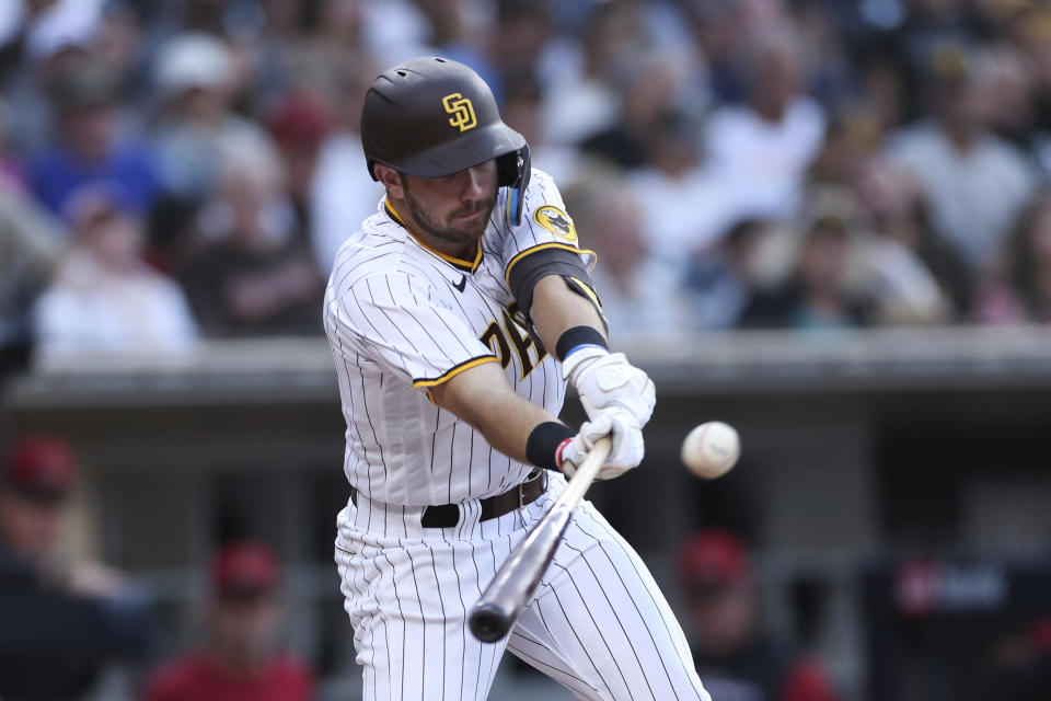 San Diego Padres' Matthew Batten hits an RBI double against the Arizona Diamondbacks during the fifth inning of a baseball game Saturday, July 16, 2022, in San Diego. (AP Photo/Derrick Tuskan)