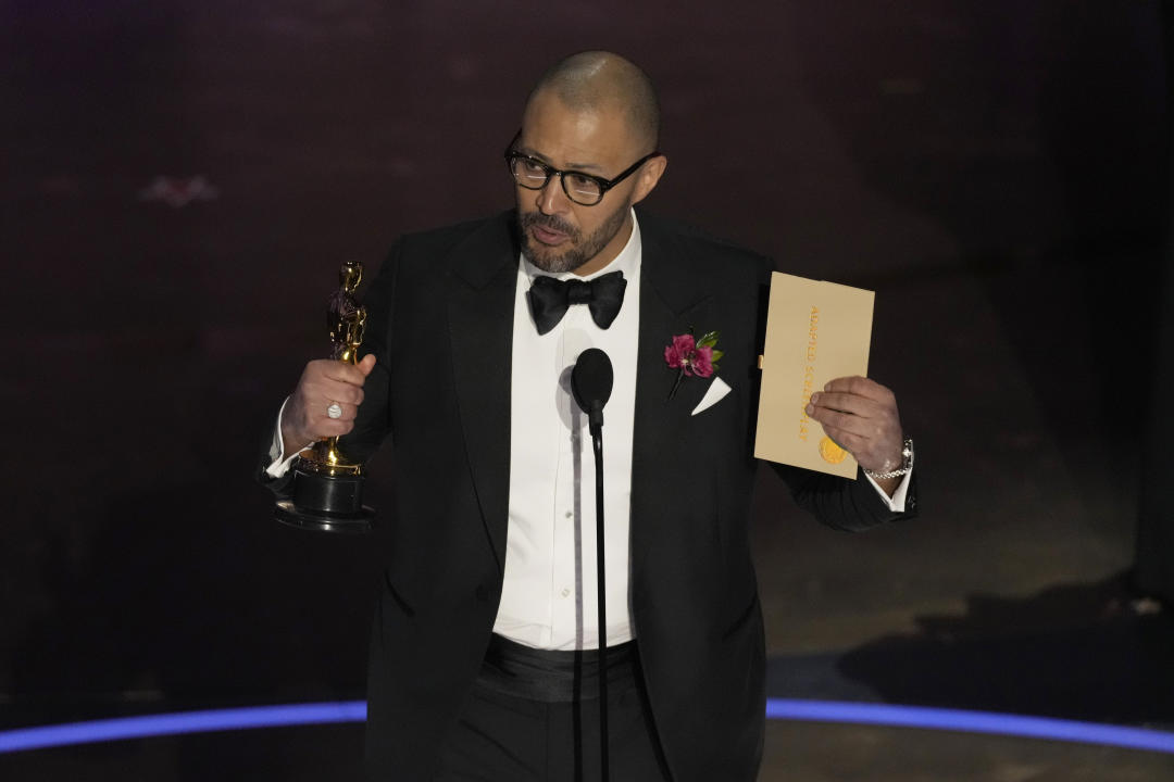 Cord Jefferson accepts the award for best adapted screenplay for 