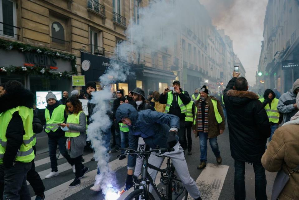 Yellow Jacket protesters in Paris earlier this month (PA)