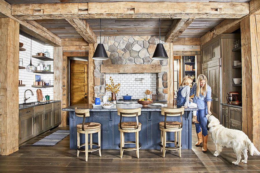 lakeside cabin home of megan and tyler duncan in bone lake, wisconsin kitchen with tons of textures countertops, subway tile, reclaimed beams, douglas fir cabinets, and rush barstools