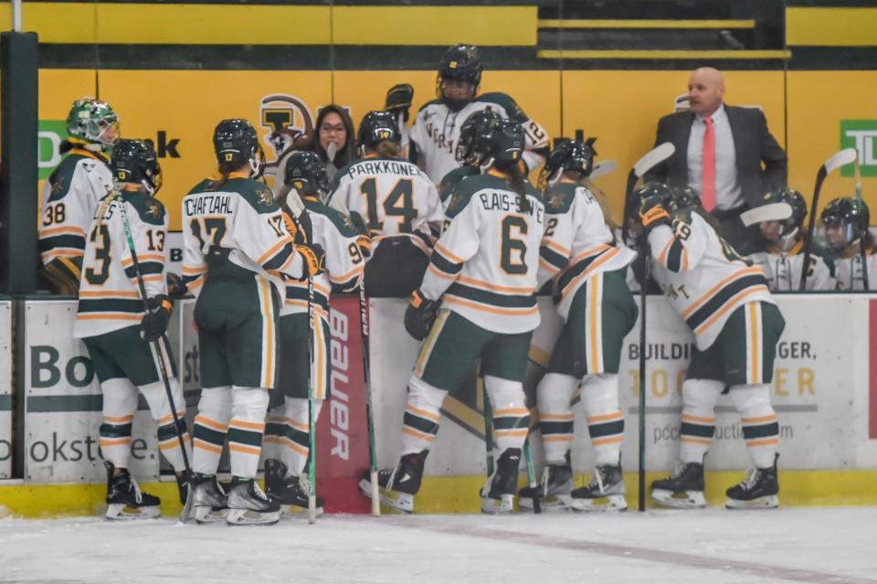 The UVM Catamounts talk it over in a time out during their loss to the Northeastern Huskies in Hockey East Action on Saturday afternoon at Gutterson Fieldhouse.