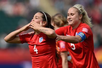 EDMONTON, AB - JULY 04:  Fara Williams of England celebrates with team mate Steph Houghton as she scores the opening goal from a penalty during the FIFA Women&#39;s World Cup Canada 2015 Third Place Play-off match between Germany and England at Commonwealth Stadium on July 4, 2015 in Edmonton, Canada.  (Photo by Dennis Grombkowski/Bongarts/Getty Images)