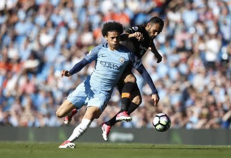 Britain Football Soccer - Manchester City v Hull City - Premier League - Etihad Stadium - 8/4/17 Manchester City's Leroy Sane in action with Hull City's Ahmed Elmohamady Action Images via Reuters / Ed Sykes Livepic