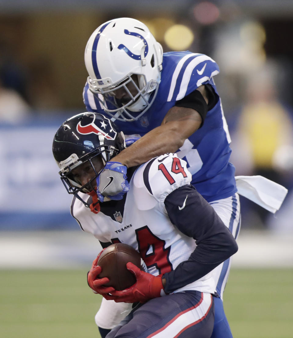<p>Houston Texans’ Chris Thompson (14) is tackled by Indianapolis Colts’ Chris Milton during the first half of an NFL football game, Sunday, Dec. 31, 2017, in Indianapolis. (AP Photo/Michael Conroy) </p>