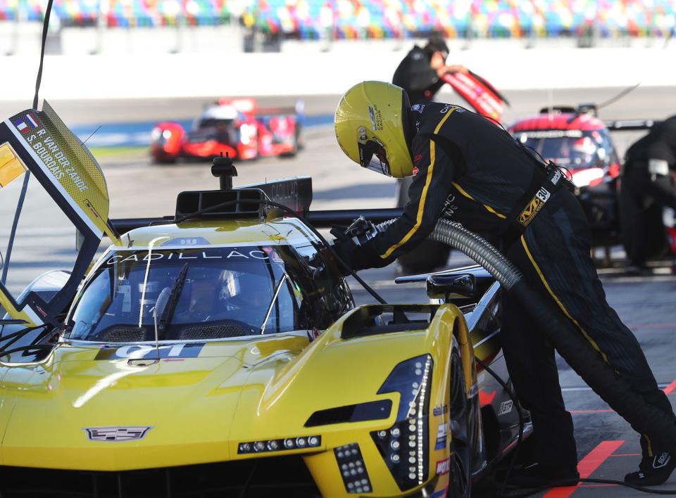 Crewmen service the No. 01 Cadillac, Wednesday December 6, 2023 as IMSA teams take Daytona International Speedway for the first of four days of testing for the Rolex 24.