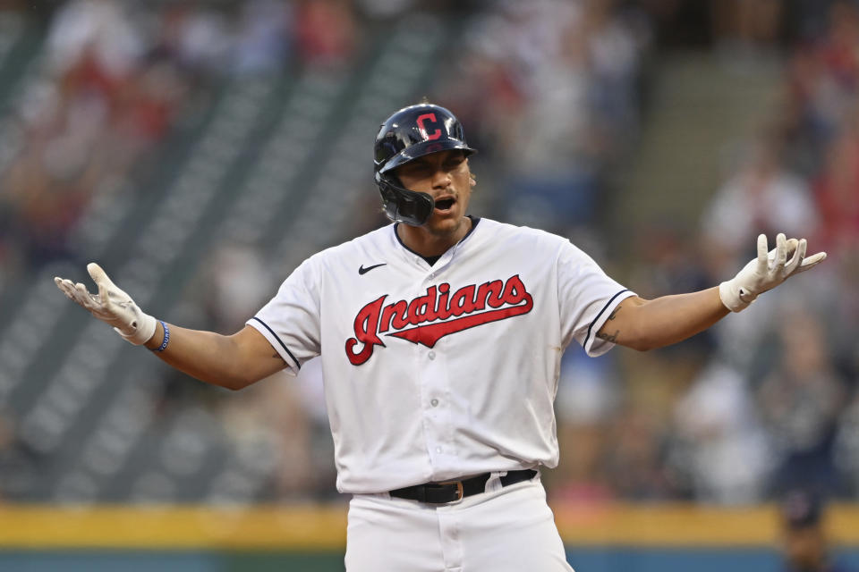 Cleveland Indians' Josh Naylor (22) celebrates after hitting a double in the sixth inning of a baseball game against the Minnesota Twins, Tuesday, April 27, 2021, in Cleveland. (AP Photo/David Dermer)