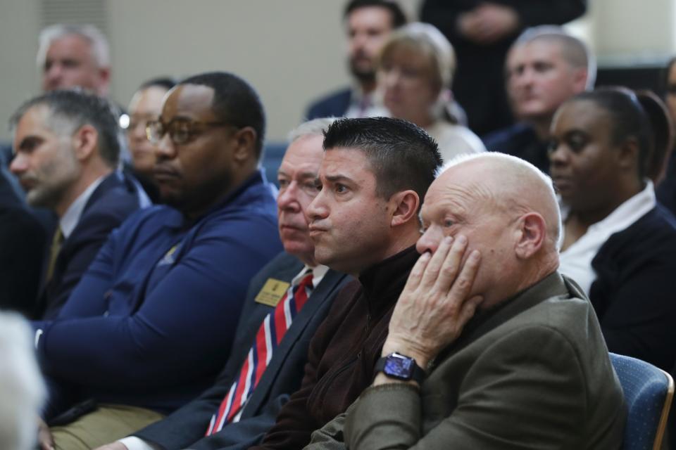 Attendees listened as the Department of Justice announced the findings of a sweeping investigation of the Louisville Metro Police Department at Metro Hall in Louisville, Ky. on Mar. 8, 2023.   The report was the result of a nearly two-year probe following the killing of Breonna Taylor.