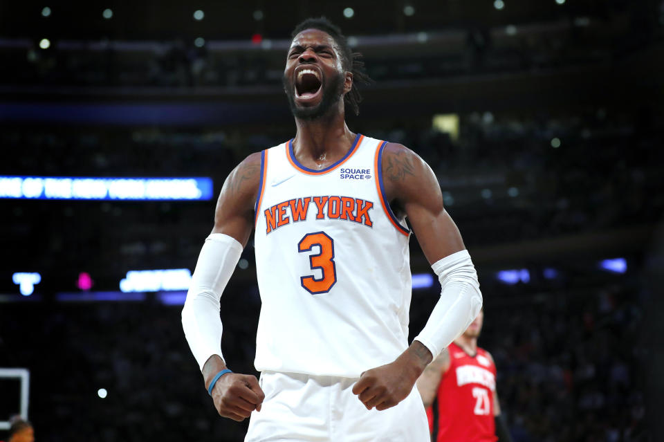 FILE - New York Knicks center Nerlens Noel reacts after the Knicks scored against the Houston Rockets during the second half of an NBA basketball game in New York on Nov. 20, 2021. The New York Knicks are trading Nerlens Noel and Alec Burks to the Detroit Pistons, a person with knowledge of the details said Tuesday, June 28, 2022, moves that free up nearly $20 million more for free agency. (AP Photo/Noah K. Murray, File)