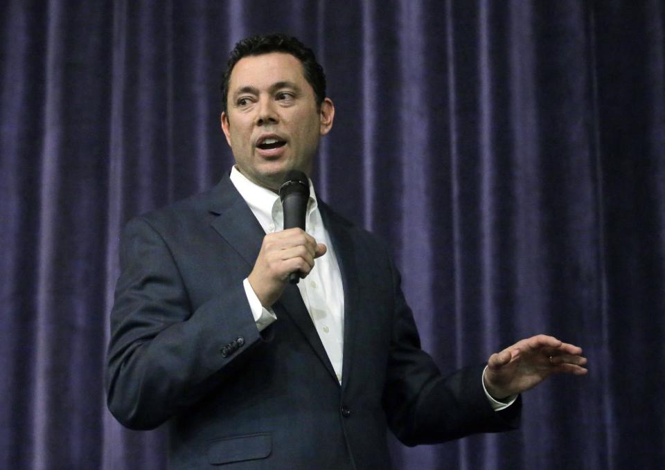 Rep. Jason Chaffetz speaks during a town hall meeting at Brighton High School, Thursday, Feb. 9, 2017, in Cottonwood Heights, Utah. Hundreds of people lined up early for a town hall with Chaffetz on Thursday evening, many holding signs criticizing the congressman's push to repeal the newly-named Bears Ears National Monument in southern Utah. (AP Photo/Rick Bowmer)