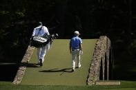 Brian Harman walks to the 12th green during a practice round in preparation for the Masters golf tournament at Augusta National Golf Club Sunday, April 7, 2024, in Augusta, Ga. (AP Photo/Charlie Riedel)