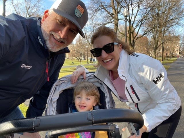 The Saladino family — mom, Mary, dad, Anthony, and son, Henry — on an outing to a park