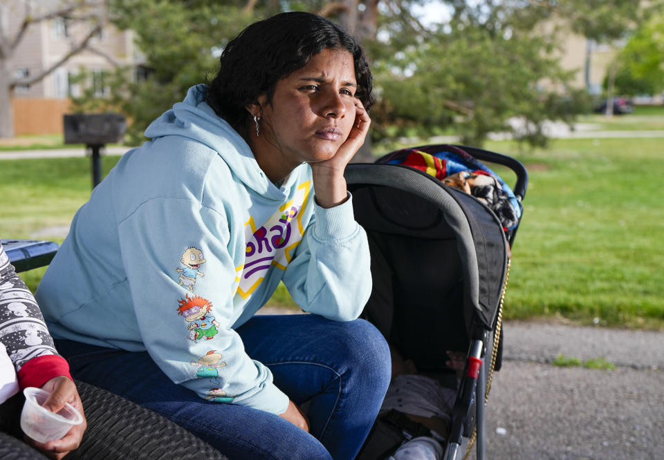 Ivanni Herrera looks on during an interview in a park Friday, May 18, 2024, in Aurora, Colo. (AP Photo/Jack Dempsey)