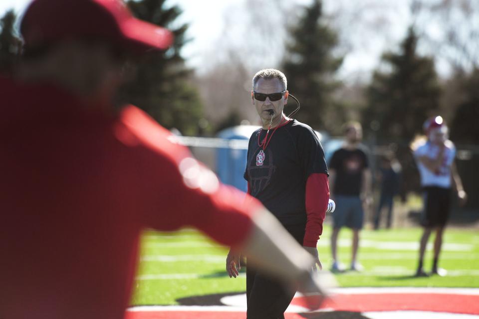 USD head coach Bob Nielson during spring football camp Monday, April, 8, on the outdoor practice field at the university in Vermillion.