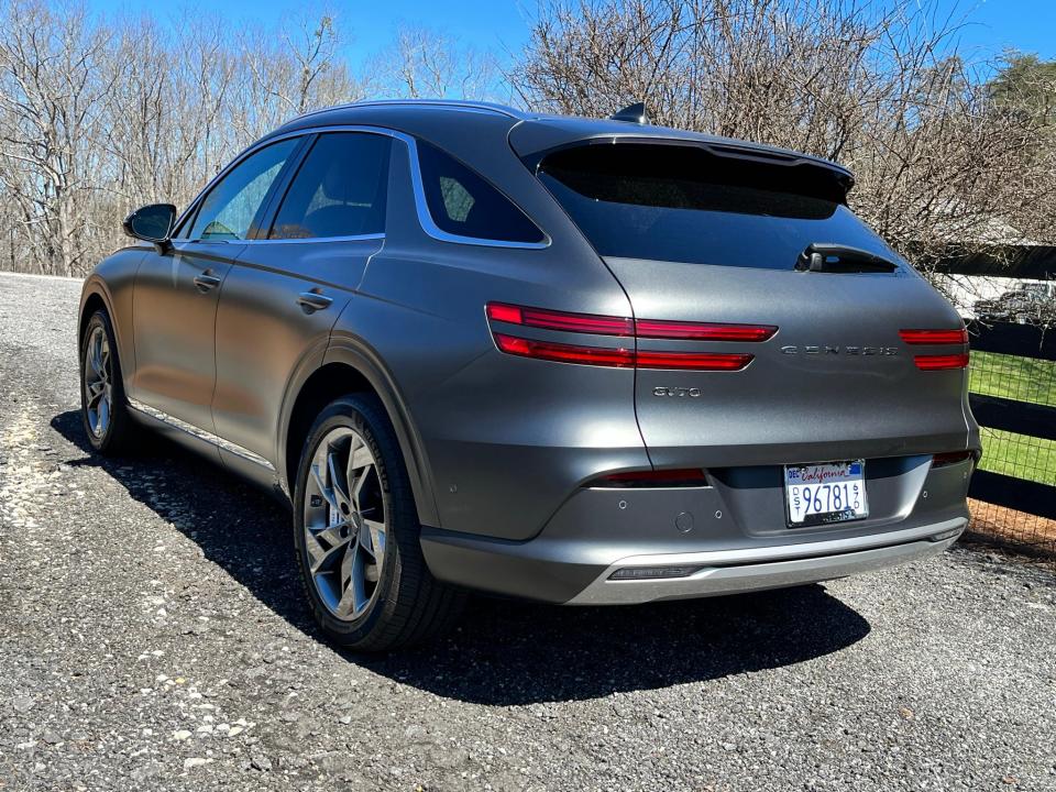 The 2023 Genesis GV70 EV SUV's has no exhaust pipes -- one of the few visual differences from gasoline-burning GV70s.