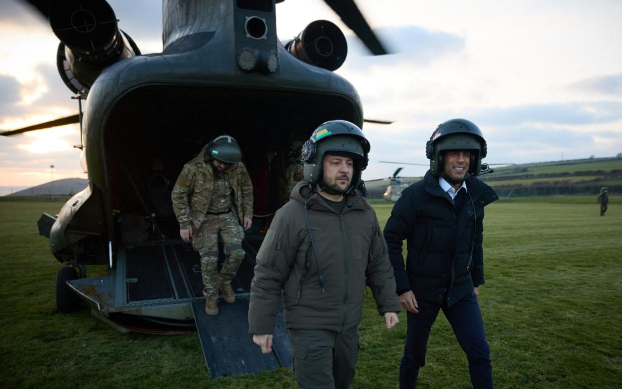 Prime Minister Rishi Sunak and Ukrainian President Volodymyr Zelensky arriving to visit Ukrainian troops being trained to command Challenger 2 tanks at a military facility in Lulworth, Dorset - Ukrainian Presidential Press Office/PA Wire