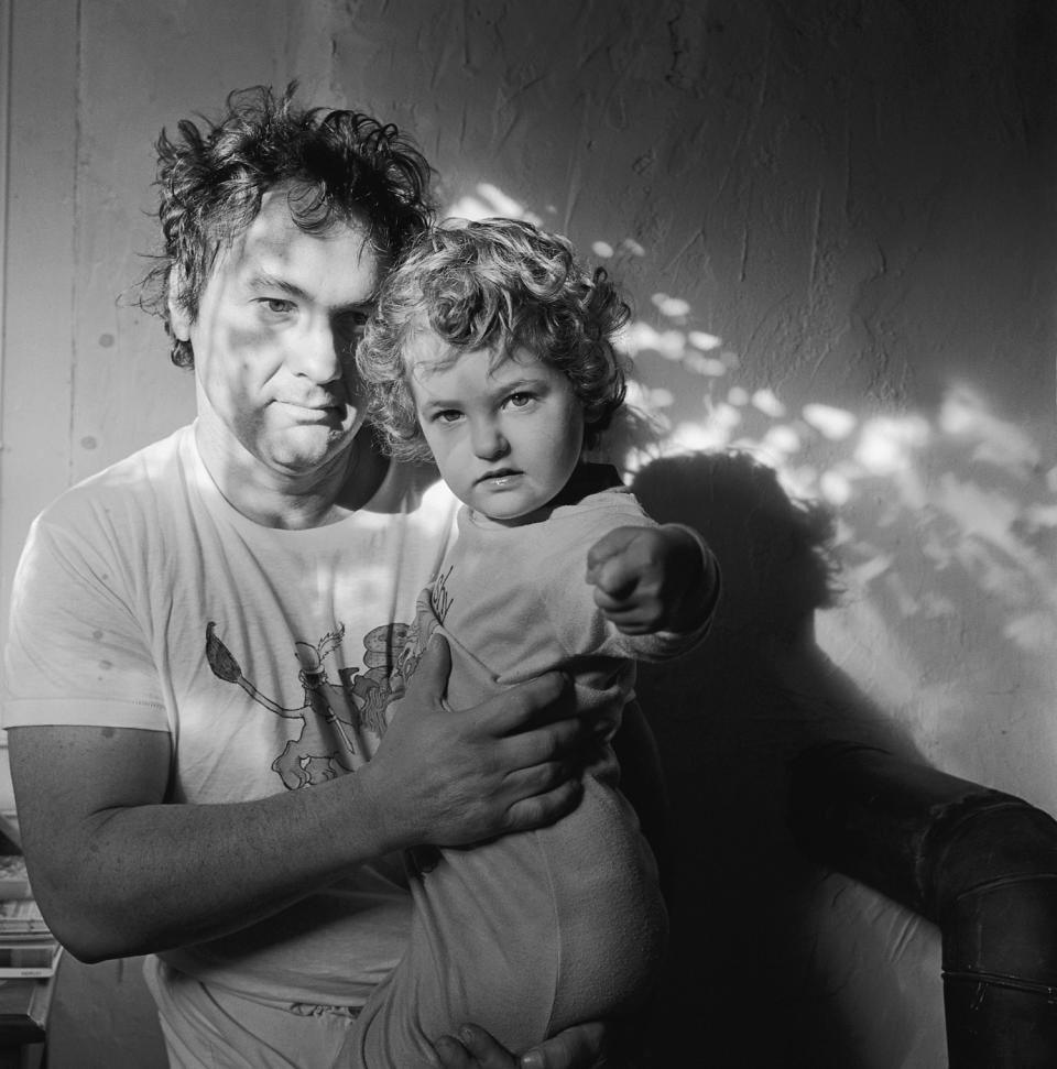 This photo provided by the Robert Mann Gallery by American photographer Larry Fink, is titled, “Self Portrait with Molly, Martins Creek," 1983. Fink, an acclaimed and adventurous photographer whose subjects ranged from family portraits and political satire to working class lives and the elite of show business and Manhattan society, died Saturday, Nov. 25, 2023, at age 82. (Larry Fink/Courtesy Robert Mann Gallery via AP)
