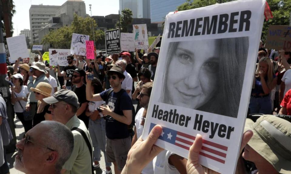 A demonstrator holds up a photo of Heather Heyer during a demonstration against racism in Los Angeles. The Unite the Right rally where Heyer was killed started as a Facebook event.