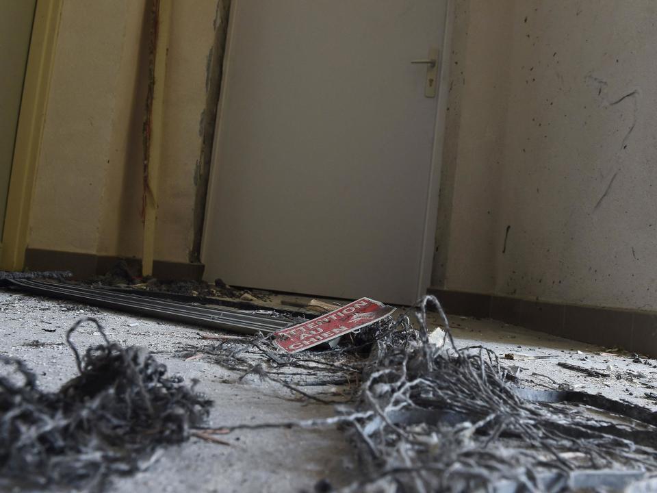 Debris of an explosion after French anti-terrorist police raided a flat, where suspects believed to be involved in plotting an attack were arrested, in Clapiers, near Montpellier, on 10 February (EPA)