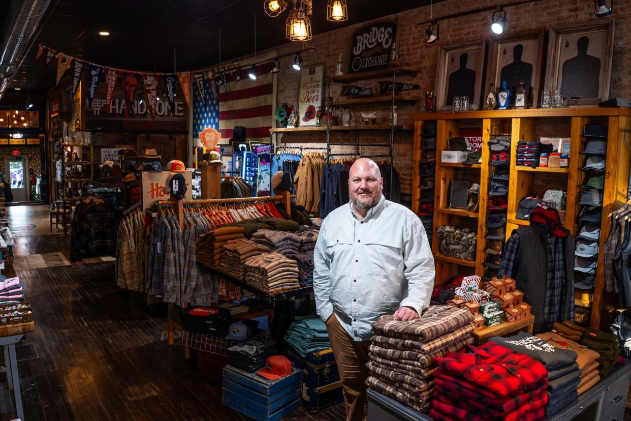 Bridge Street Exchange owner Kevin Begola stands in a section of his store in Fenton on Wednesday, November 15, 2023.