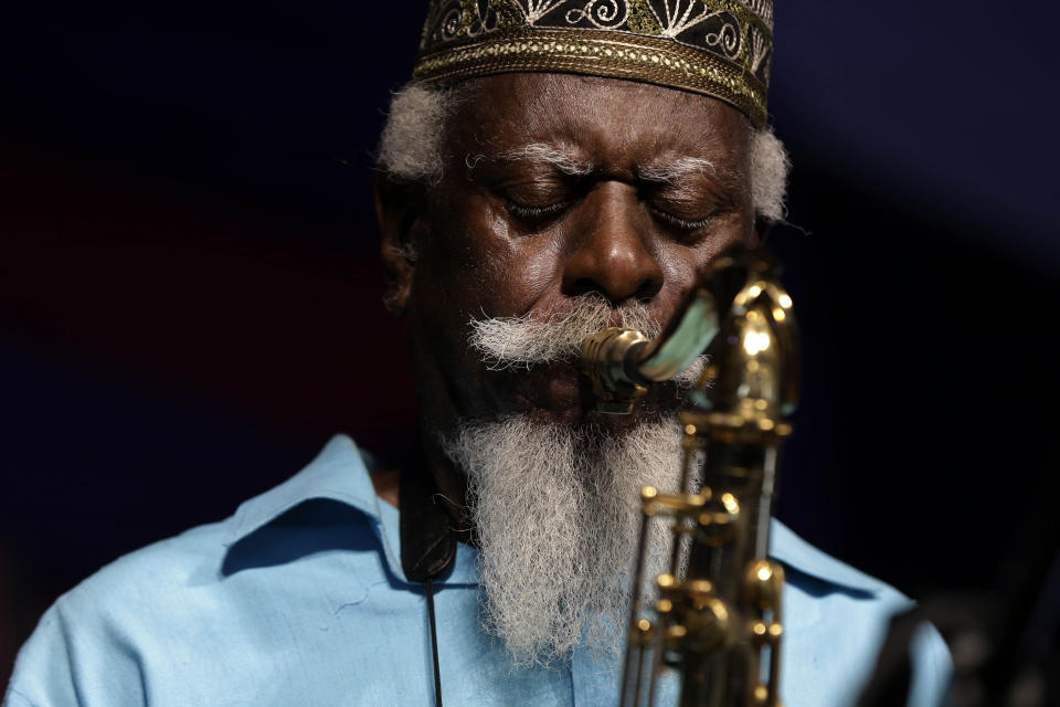 FILE - Jazz saxophonist Pharoah Sanders performs at the New Orleans Jazz and Heritage Festival in New Orleans, Friday, May 2, 2014. The influential tenor saxophonist revered in the jazz world for the spirituality of his work, has died, his record label announced on Saturday, Sept. 24, 2022. He was 81. (AP Photo/Gerald Herbert, File)