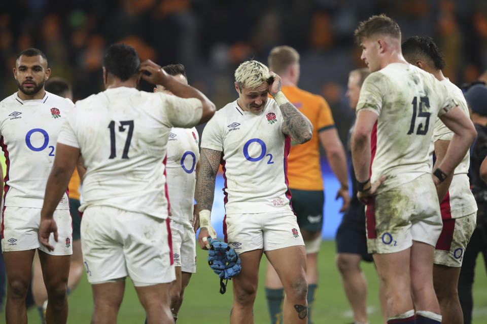England players react following their loss in the rugby international against the Wallabies in Perth, Australia, Saturday, July 2, 2022. (AP Photo/Gary Day)