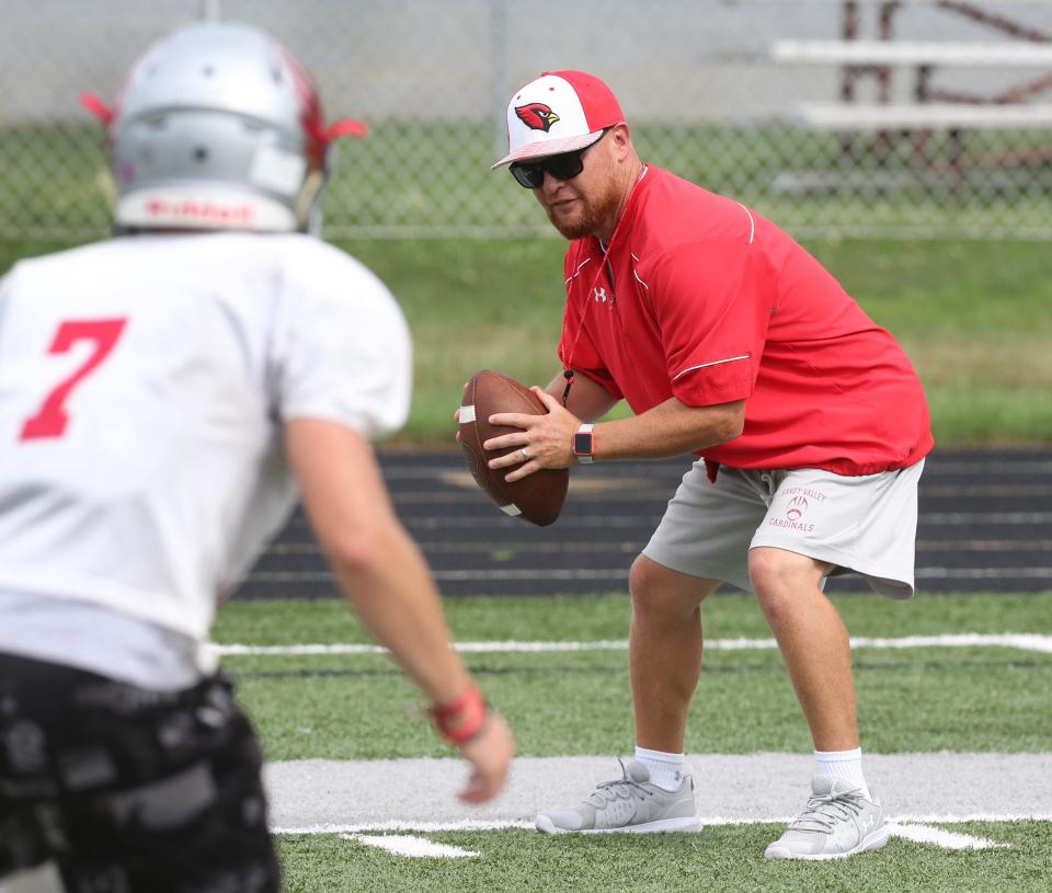 Sandy Valley head football coach Brian Gamble leads practice at the school on Tuesday, August 17, 2021.