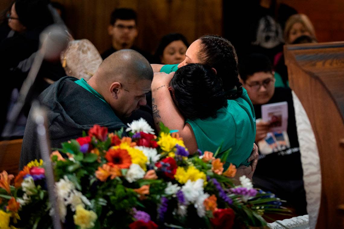 Erica Trevino comforts her son’s friend during his funeral in Waurika, Oklahoma, on Saturday, Jan. 28, 2023. Zechariah Trevino, a 17-year-old Paschal High School junior, was killed in a shooting that injured his cousin outside Whataburger near the Fort Worth school on Jan. 20.