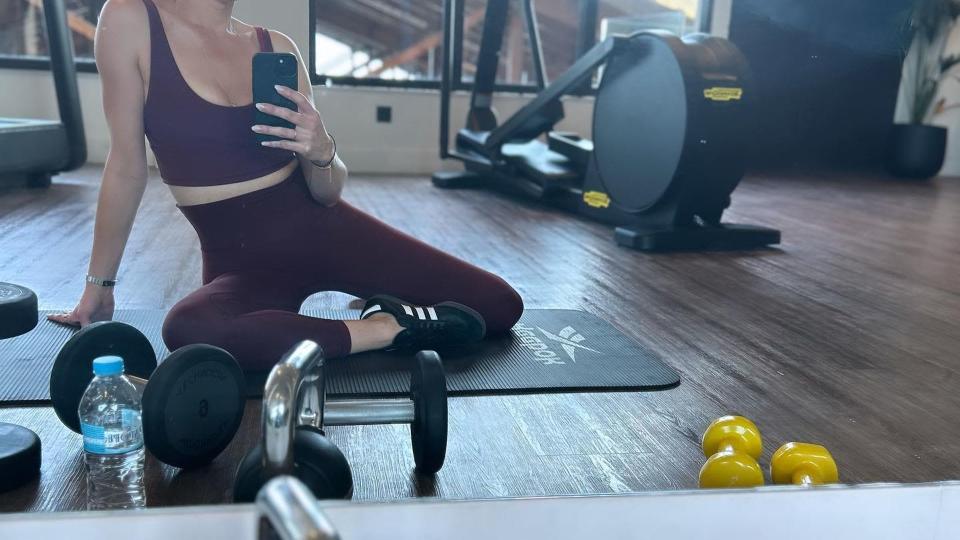 helen george posing for selfie in gym kit 