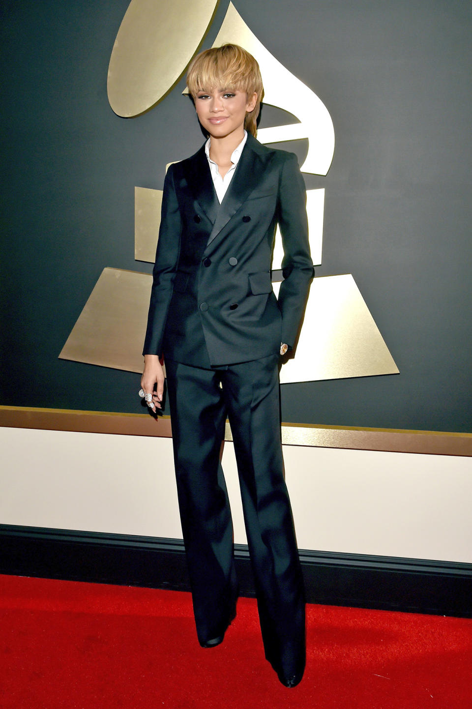 In A Dsquared2 Suit, Giuseppe Zanotti Heels And A Rolex Watch