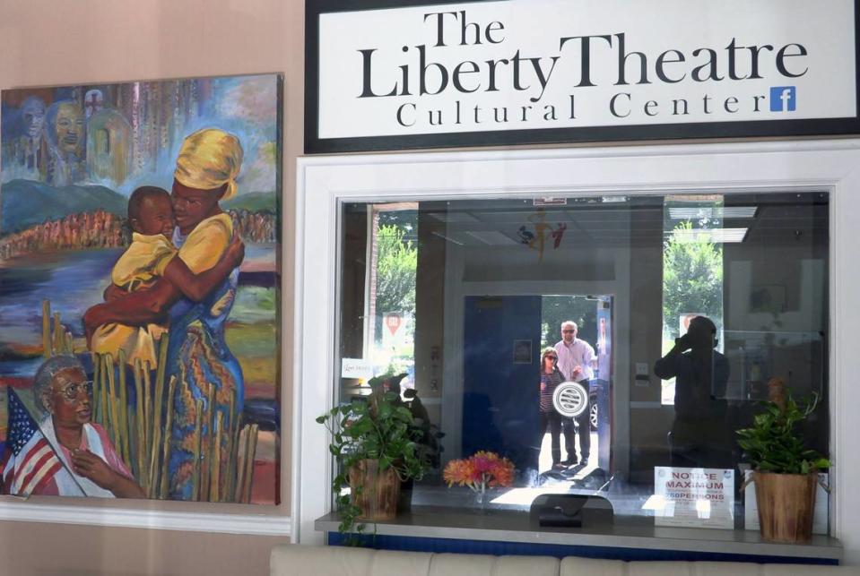 People enter The Liberty Theatre Cultural Center Wednesday morning to hear Shae Anderson, executive director of The Liberty Theatre in Columbus, Georgia, present her State of the Liberty Theatre address. 07/17/19