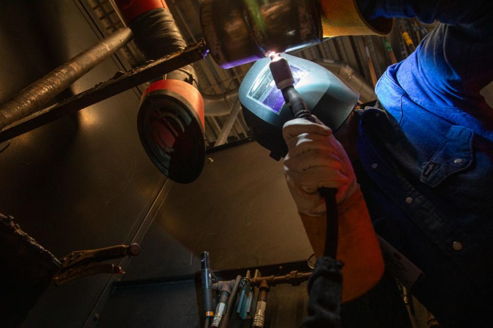 Del Mar College student Remington Wright performs a tungsten inert gas weld in a stall during a competition at Del Mar College on Friday, Nov. 3, 2023.