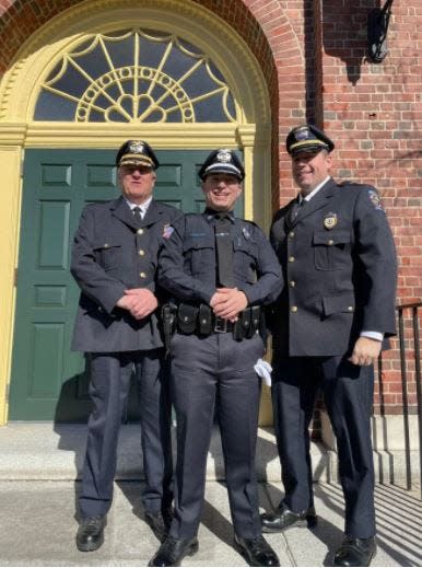 From left, Dighton Police Chief Robert MacDonald, Officer Aaron Swartz and Lt. Shawn Cronin at the MPTC Plymouth Police Academy 71st Recruit Officer Class graduation on Friday, Feb. 18, 2022.