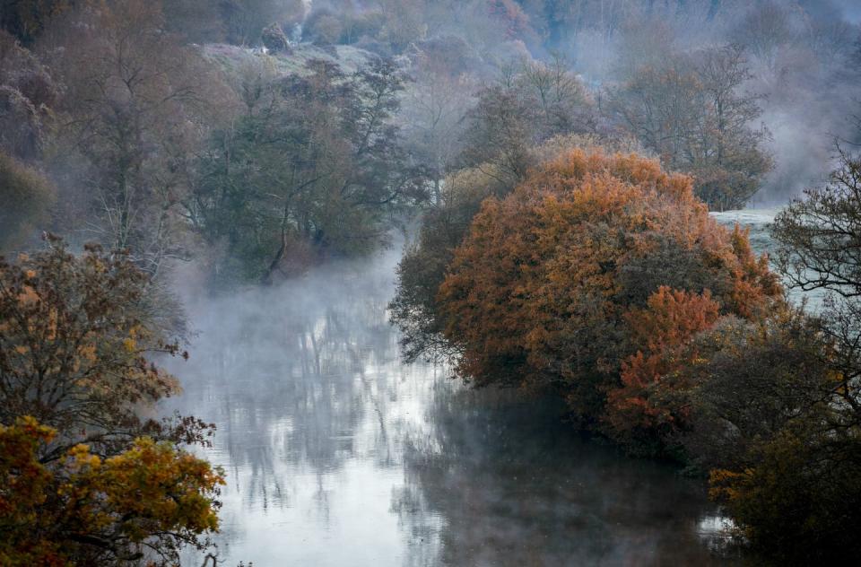 <p>Mist rolls over a river near Bath, England.</p>