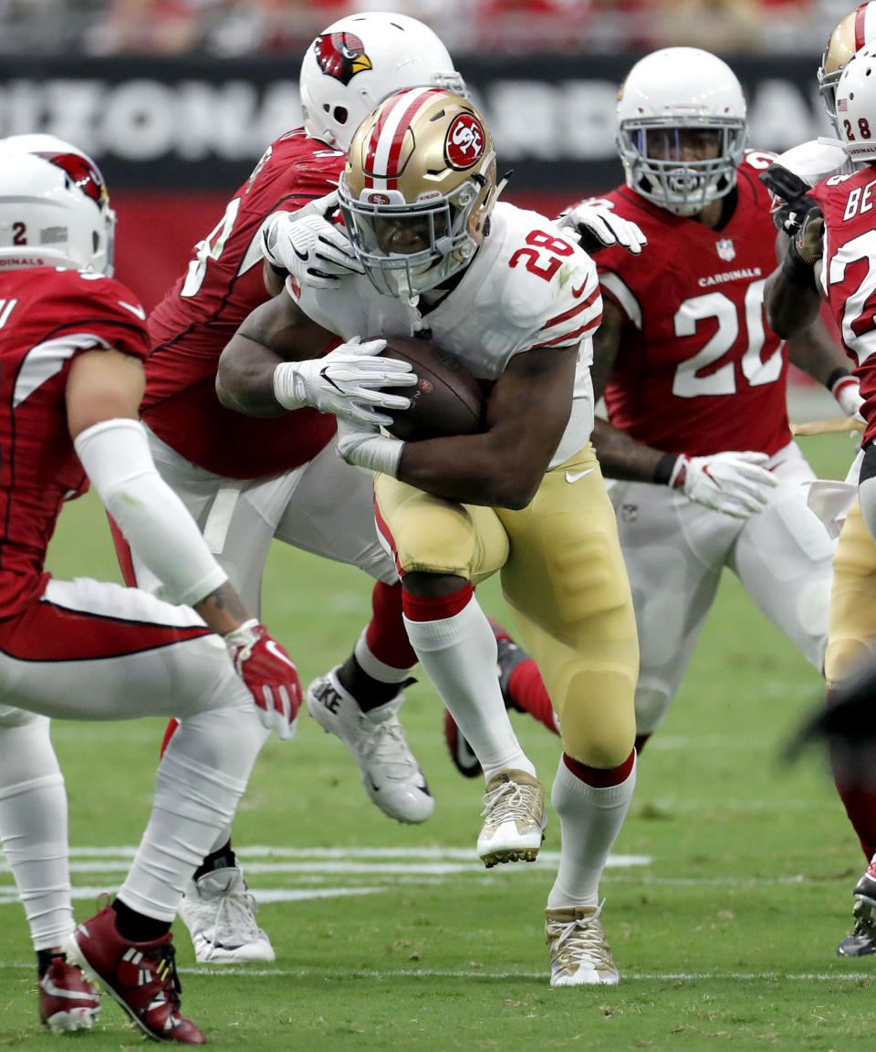 Carlos Hyde is on pace to rush for nearly 1,300 yards and another 350 receiving. (AP)