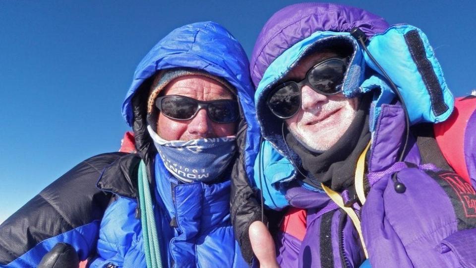 Rick Allen with former climbing partner Sandy Allan on the Mazeno ridge in Pakistan at the summit of Nanga Parbat in the far distance (Sandy Allan/PA) (PA Media)