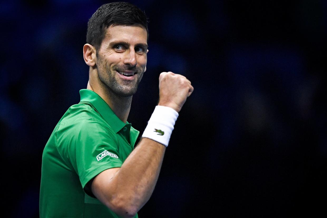 Novak Djokovic of Serbia celebrates during his round robin match against Stefanos Tsitsipas of Greece during day two of the Nitto ATP Finals. Novak Djokovic won the match 6-4, 7-6(4).