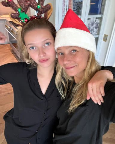 <p>Gwyneth Paltrow/Instagram</p> Gwyneth Paltrow shares Christmas selfie of her and lookalike daughter Apple wearing holiday accessories