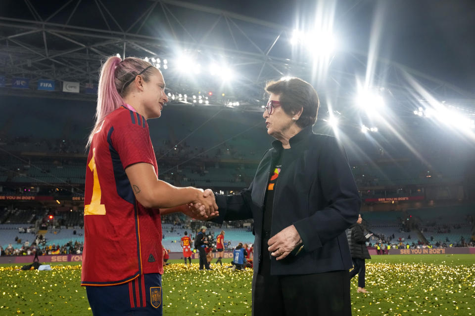 Spain's Alexia Putellas shakes hands with tennis legend Billie Jean King at the end of the Women's World Cup soccer final between Spain and England at Stadium Australia in Sydney, Australia, Sunday, Aug. 20, 2023. Spain won 1-0. (AP Photo/Abbie Parr)