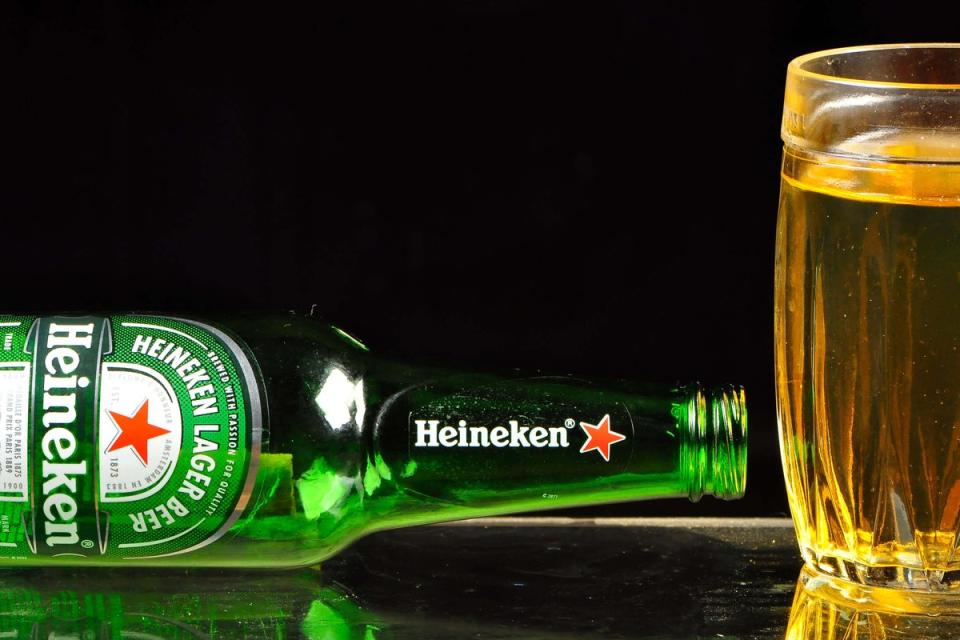 Sales for mega-brewer Heineken fell in the UK and globally, but revenue was still up as beerprices rose.(Alamy/PA)