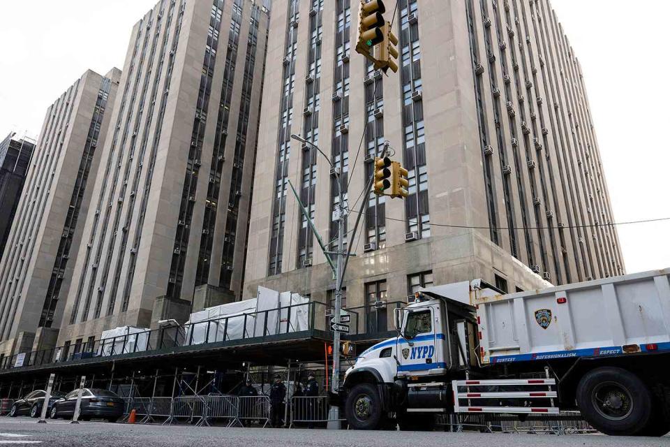 <p>ANGELA WEISS/AFP via Getty Images</p> New York police guard the Manhattan Criminal Court in New York City where former US President Donald Trump is attending his tria