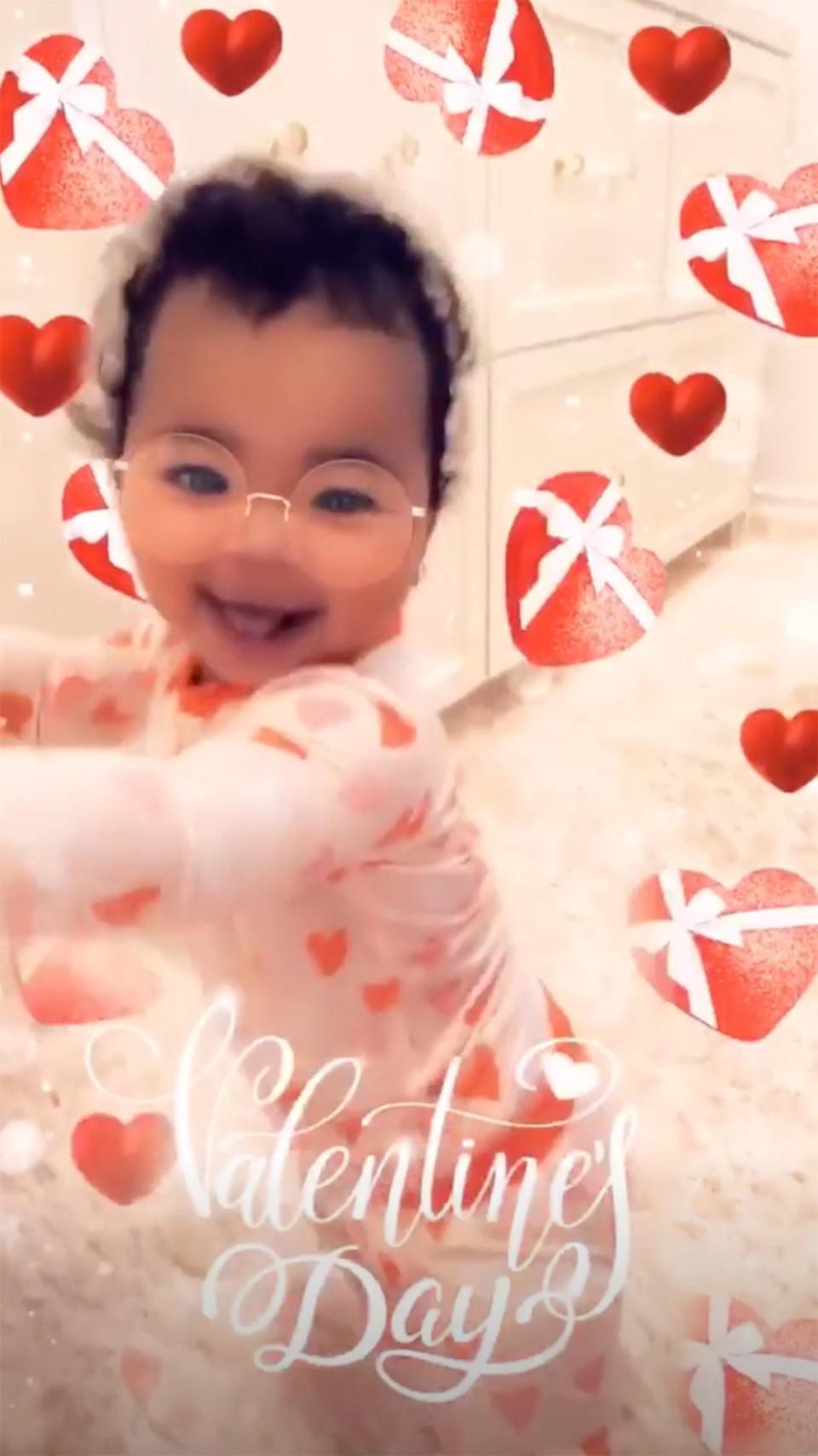 Happy Valentine’s Day, True! Dressed in heart-print pajamas, Khloé’s little one giggled for the camera as the two played with love-themed filters to <a href="https://people.com/tv/khloe-kardashian-spends-valentines-day-true/" rel="nofollow noopener" target="_blank" data-ylk="slk:celebrate the holiday.;elm:context_link;itc:0;sec:content-canvas" class="link ">celebrate the holiday.</a>