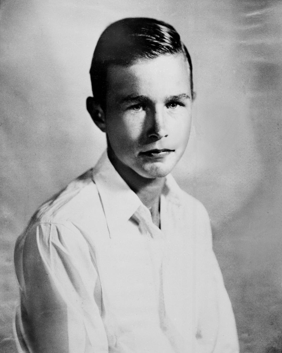 George Bush is shown at age 14 or 15 in 1939. Bush was born in 1924 in Milton, Mass., and grew up in Greenwich, Conn.