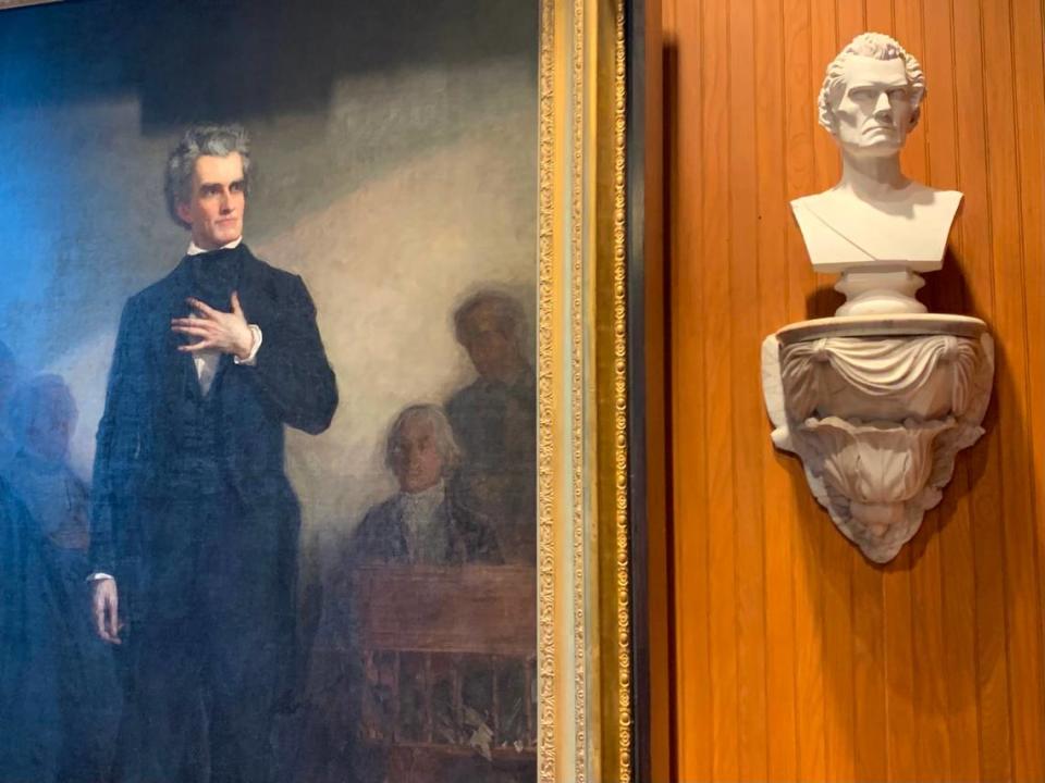 In a room connected to Charleston City Council chambers, a life-size portrait of John C. Calhoun, left, looks at a bust of his own likeness. The portrait, which was commissioned by the city in 1850, depicts Calhoun’s last Senate speech. What was painted, though, never happened.