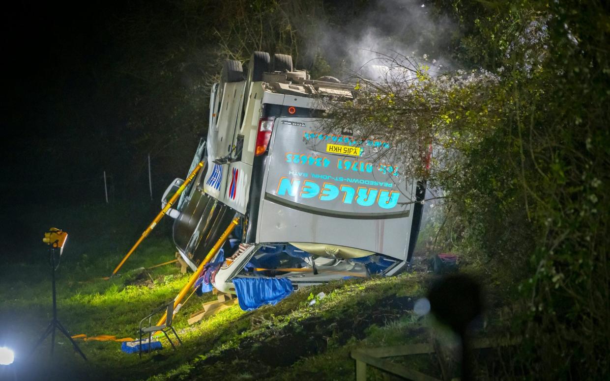 The coach carrying dozens of schoolchildren had overturned in Frome - Daniel Jae Webb / SWNS