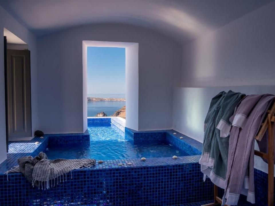 <p>Calling all fans of classic Cycladic architecture: <a href="https://www.booking.com/hotel/gr/ikies-traditional-houses.en-gb.html?aid=2200764&label=best-hotels-santorini" rel="nofollow noopener" target="_blank" data-ylk="slk:Ikies;elm:context_link;itc:0;sec:content-canvas" class="link ">Ikies</a>, whose curving whitewashed buildings are stacked up a cliff-edge, is the Santorini stay for you. The small-scale boutique hotel is on the edge of the village of Oia, with views of the caldera and neighbouring islands served straight to your terrace. </p><p>Rooms include maisonettes, studios and, of course, honeymoon suites – and with romance levels this far off the chart, any newlyweds are in for a treat. The cliffs of Oia are piled up with traditional white-and-blue houses that look out across the caldera, all adding to those amazing views.</p><p><a class="link " href="https://www.booking.com/hotel/gr/ikies-traditional-houses.en-gb.html?aid=2200764&label=best-hotels-santorini" rel="nofollow noopener" target="_blank" data-ylk="slk:CHECK AVAILABILITY;elm:context_link;itc:0;sec:content-canvas">CHECK AVAILABILITY</a></p>