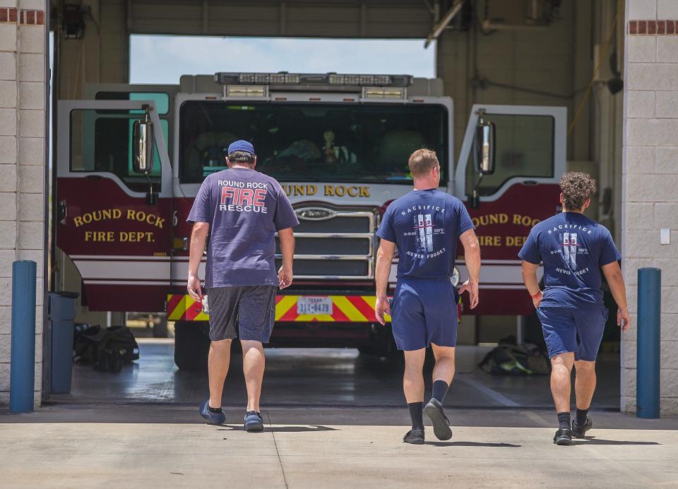 Round Rock fire and medics walk back to their station. Williamson County EMS has seen its heat-related calls increase to 99 from June 1 to July 31 this year compared with 88 calls during the same period last year, according to its records.